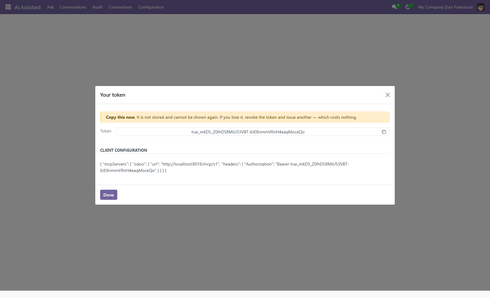 The issue wizard after issuing: the token shown once, with the JSON configuration block to paste into a client, URL and Authorization header already correct.